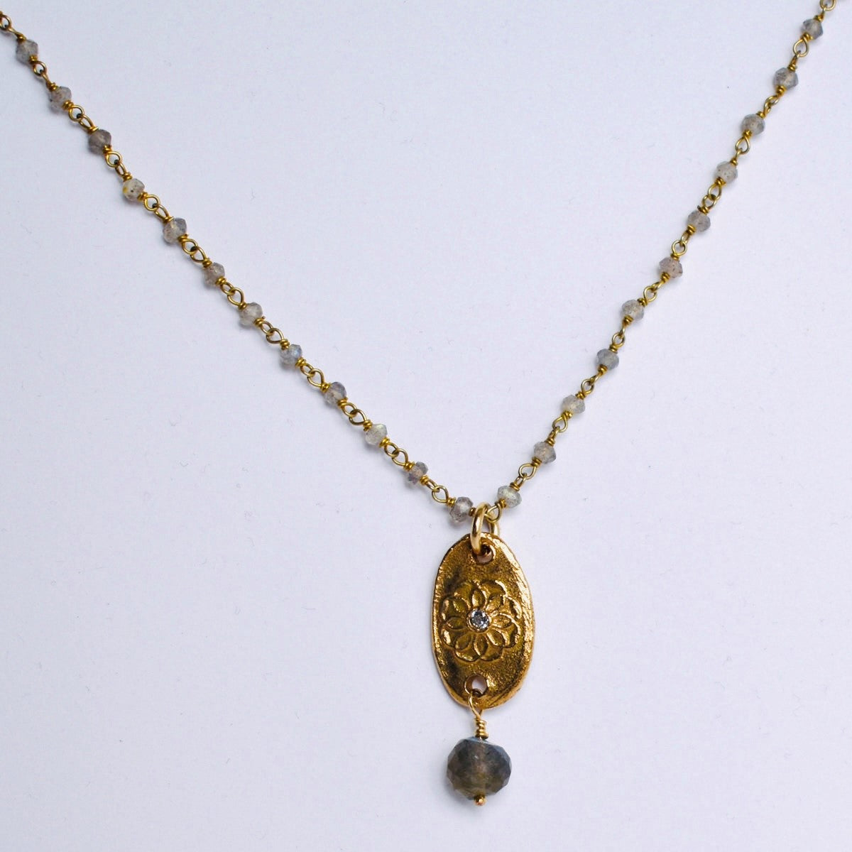 Handformed bronze pendant with CZ, faceted Labrodite bead and handmade chain